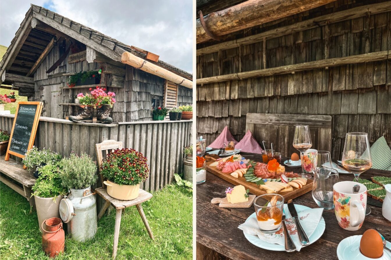 Stuhlalm Salzburg. Traditionelle Almhütte in den Alpen mit Blumen-Deko und regionaler Brettljause auf Holztisch – perfektes Ausflugsziel für Genuss, Wandern und Hüttenfrühstück in Österreich.
