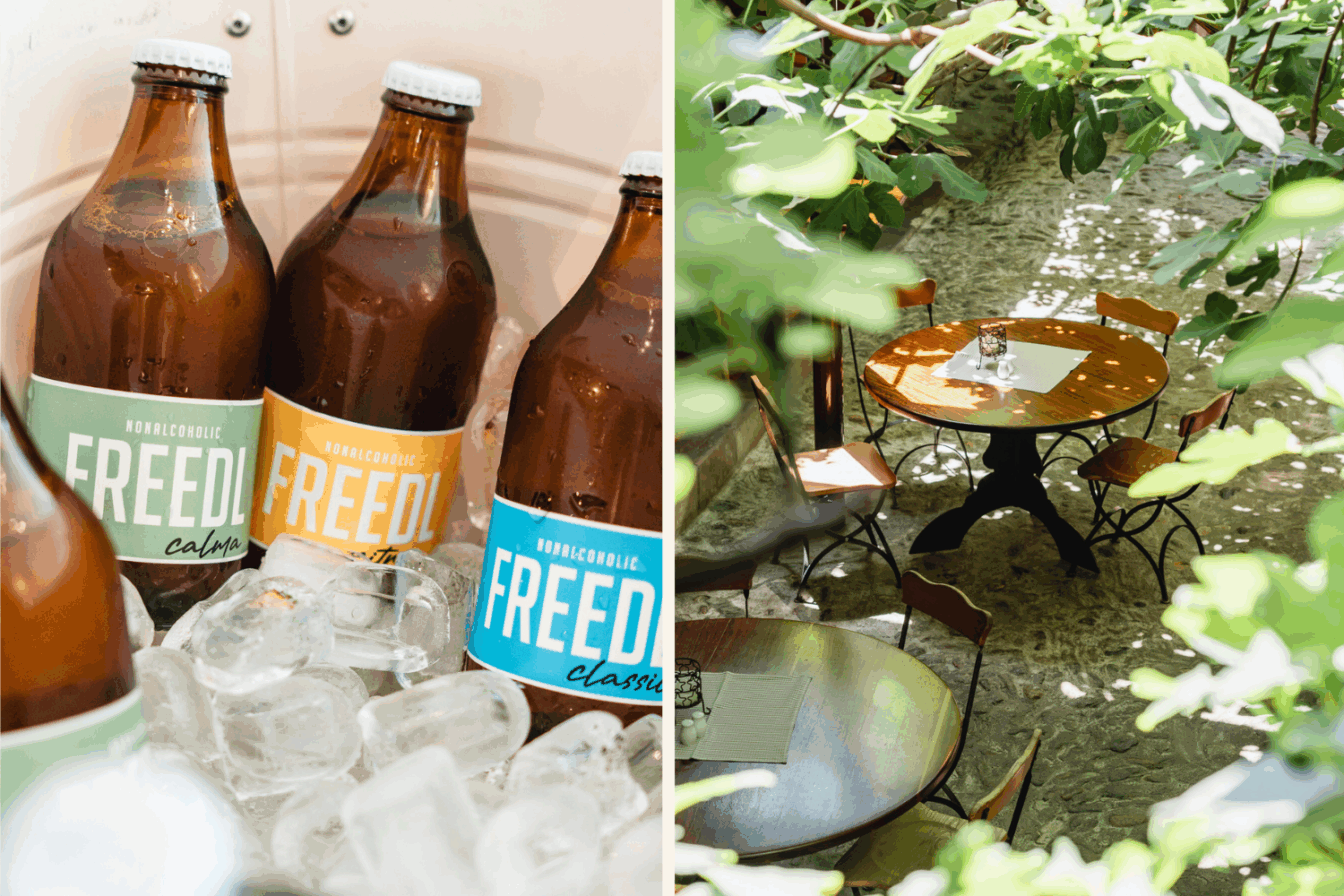 Bierflaschen mit bunten Labels in einem Eisbad sowie ein schattiger Tisch unter grünen Blättern.