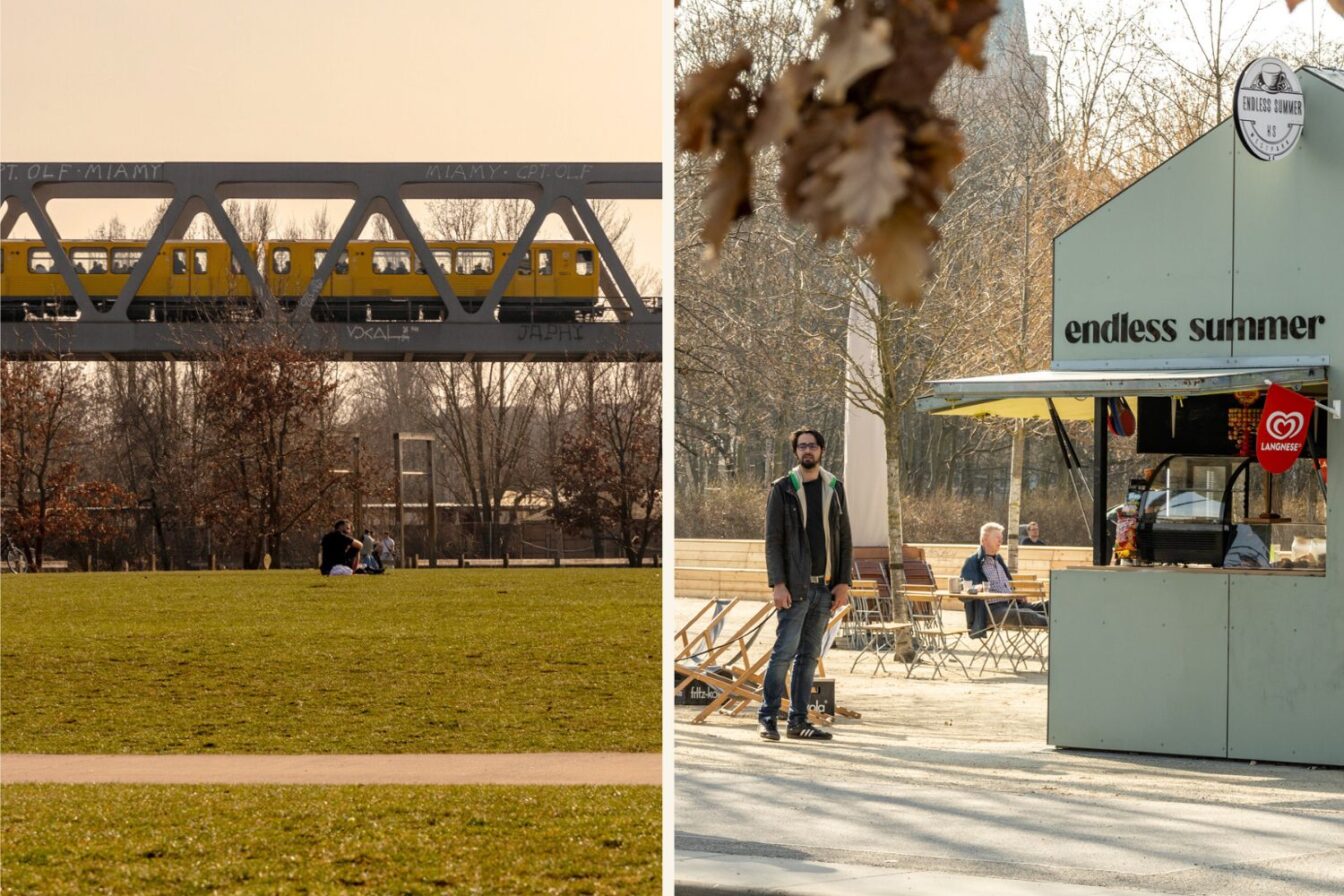 Die linke Bildhälfte zeigt eine Szene aus dem Gleisdreieckspark in Berlin-Kreuzberg, einem beliebten grünen Erholungsraum in der Stadt. Eine leuchtend gelbe U-Bahn fährt auf einer markanten Stahlbrücke mit Graffiti über den Park, während Menschen entspannt auf der Wiese sitzen und das sonnige Wetter genießen. Im Hintergrund sind kahle Bäume zu sehen, was auf eine spätere Winter- oder frühe Frühlingszeit hinweist.
Auf der rechten Bildhälfte ist ein kleiner Kiosk mit der Aufschrift „endless summer“ zu sehen, der Erfrischungen und Snacks anbietet. Ein Mann in dunkler Kleidung mit einer grünen Kapuze steht davor, während im Hintergrund weitere Parkbesucher an Tischen sitzen oder in Liegestühlen entspannen. Die Szene vermittelt eine ruhige, freundliche Atmosphäre, die für den Gleisdreieckspark als urbanen Rückzugsort mit einer entspannten Gemeinschaft charakteristisch ist.