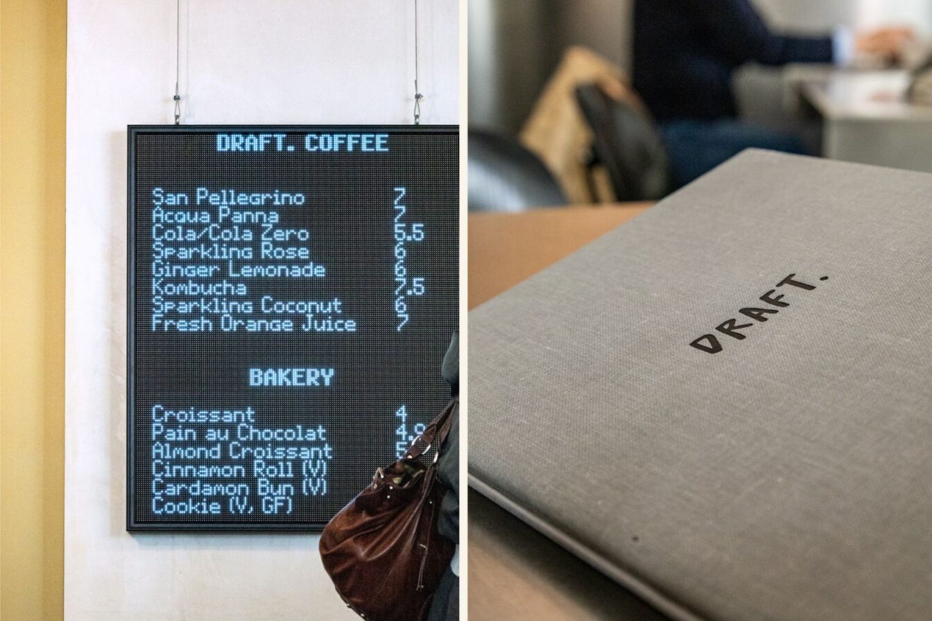Moderne Café-Szene bei Draft, einem stilvollen Ort für Brunch in Zürich, mit einer digitalen Getränkekarte links und einem grauen Menübuch mit dem Schriftzug „Draft.“ rechts im Bild.