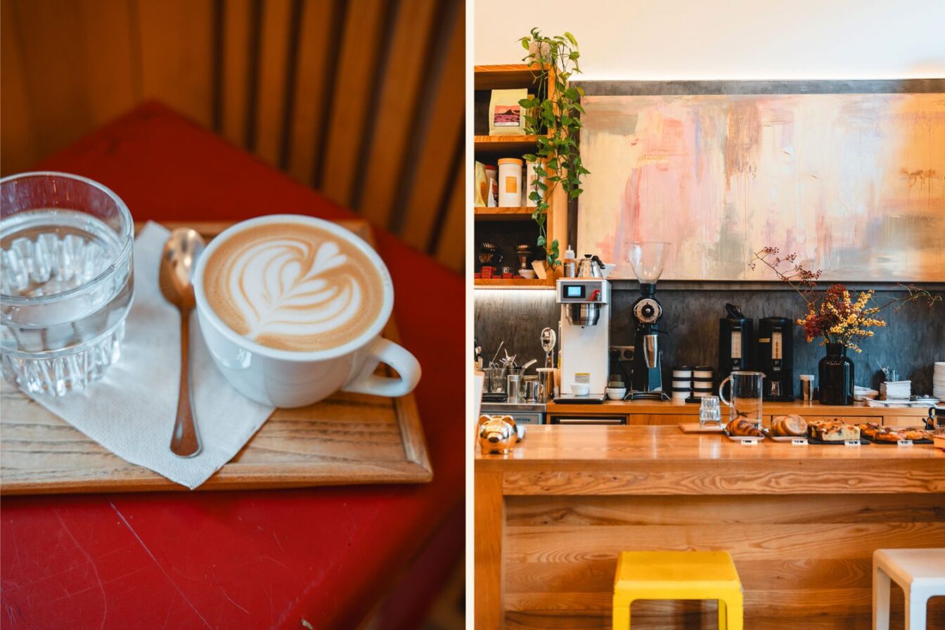Ein helles Café mit buntem Gemälde hinter der Theke und Latte Art